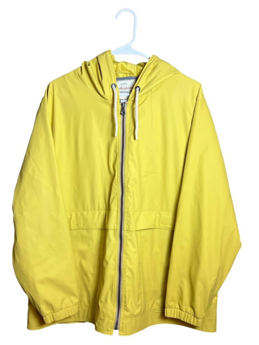 This classic bright yellow windbreaker from Weatherproof Vintage features a mesh